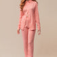 Modelo usando Full Look Rose com camisa e calça, perfeito para eventos formais e casuais.
