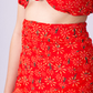 Close-up do pareo Flower Pau-Wer vermelho com estampa floral vibrante